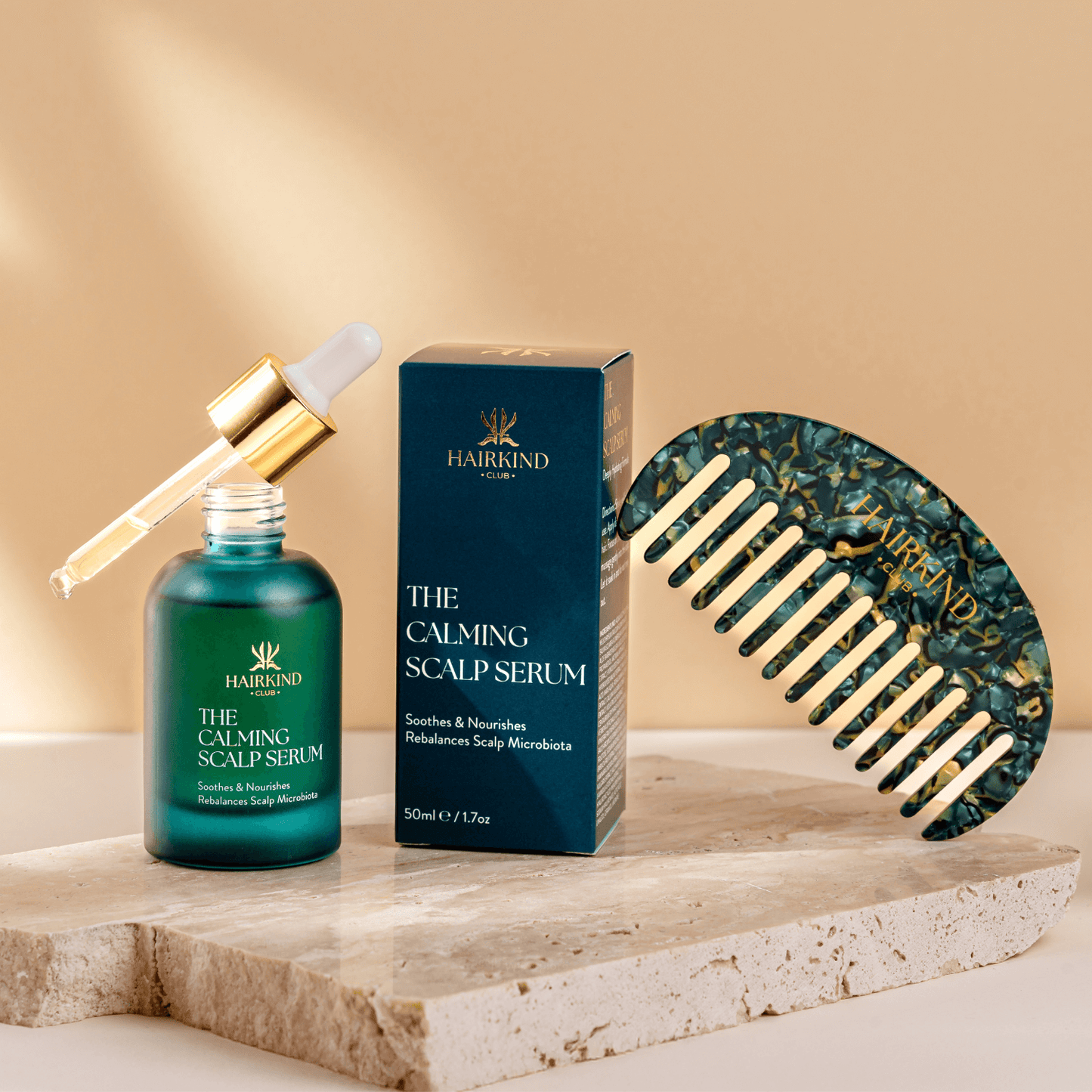 HairKind 2 Serum + Comb Bundle package with emerald green bottles and sustainable scalp comb