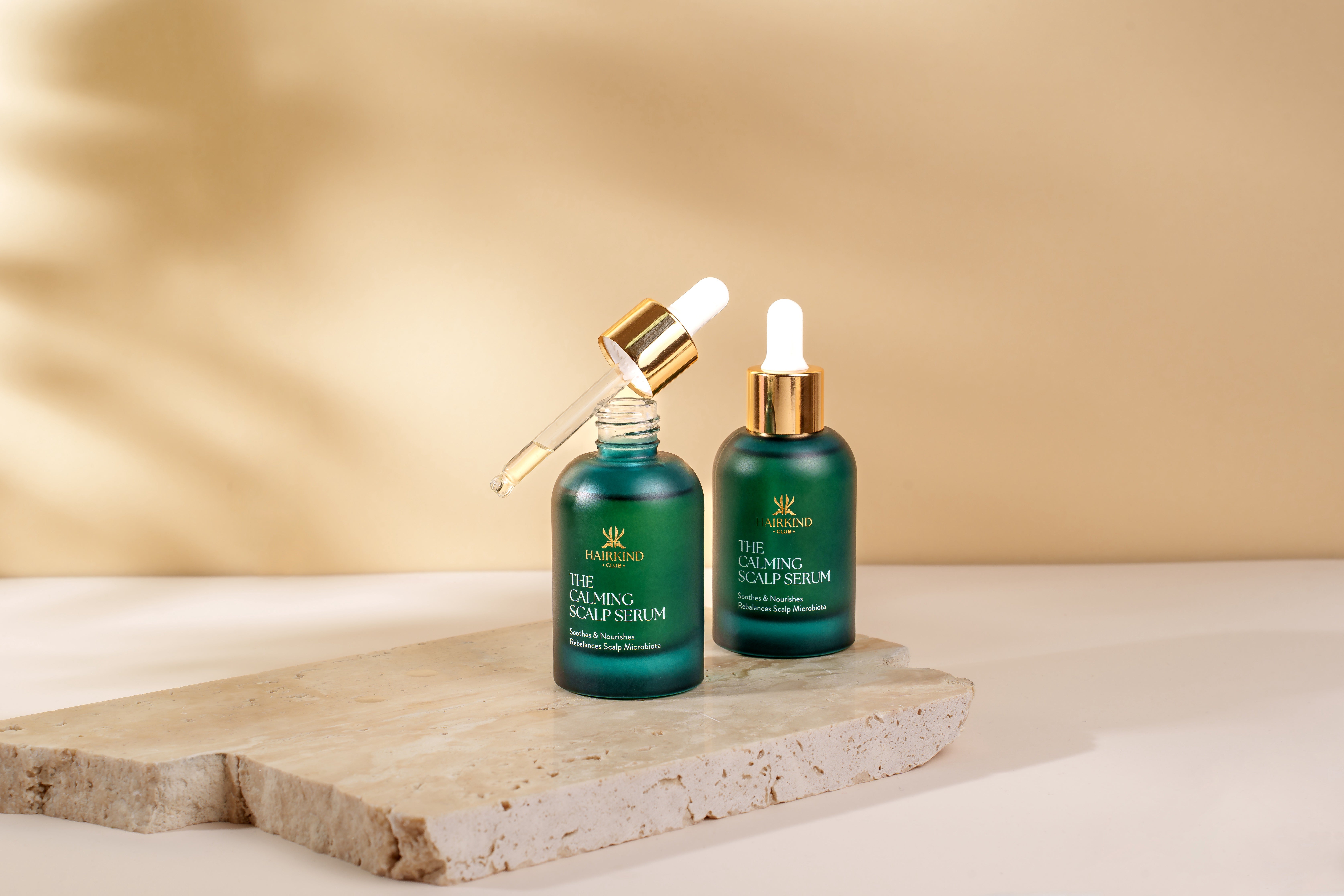 Two bottles of The Calming Scalp Serum