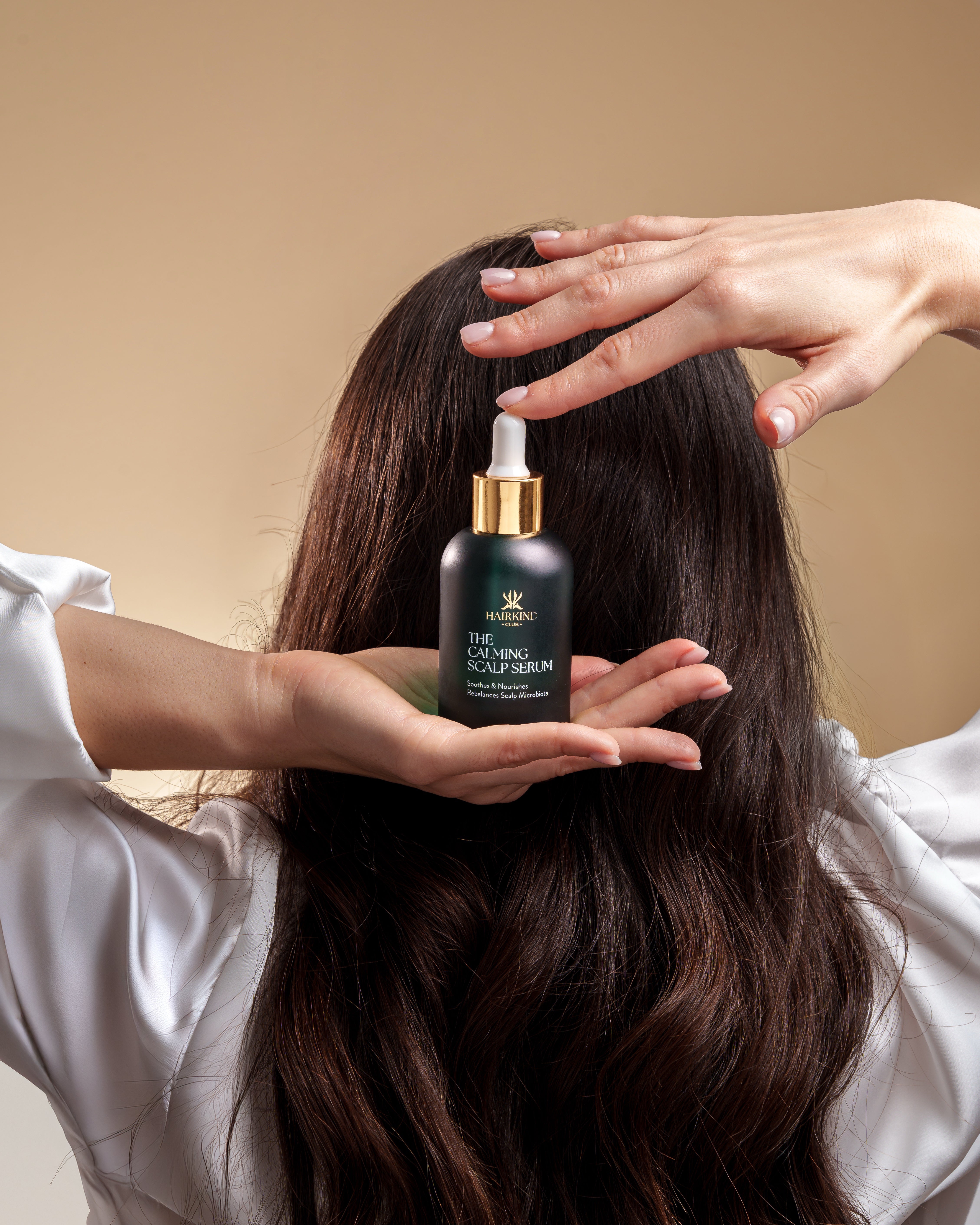Letting The Calming Scalp Serum absorb into the scalp